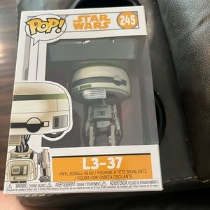 Funko POP! Star Wars #245 L3-37 Robot Vinyl Bobble-Head.

Shelf wear and small r